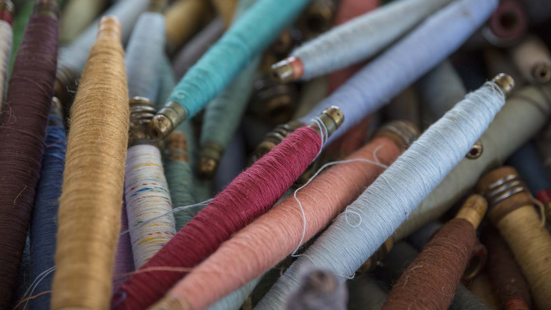 Assorted colour thread spools